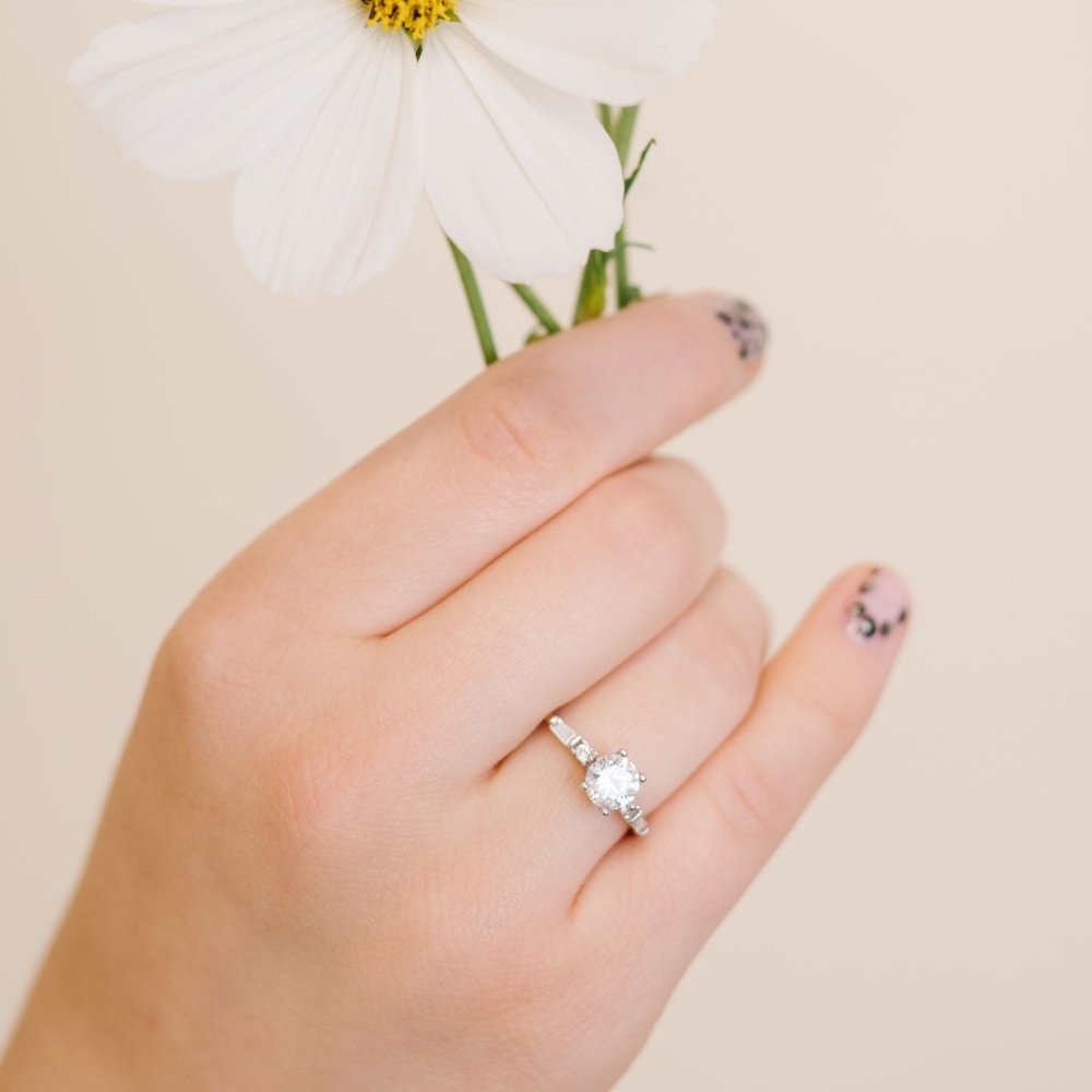 Solitaire Accented with Baguettes Ring